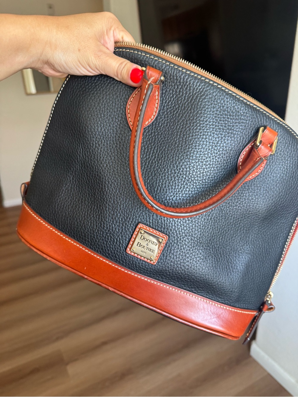 Dooney & Bourke Black Pebbled Leather Satchel with Brown Trim and Gold Hardware